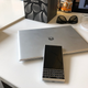 A silvery Key 2 resting on the equally angular Huawei MateBook Pro.